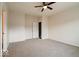 Bright bedroom with neutral walls, carpet, and a white door, offering a blank canvas for personalization at 2452 Bristol Dr, Franklin, IN 46131
