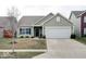 Lovely single-Gathering home with a two-car garage and a welcoming entrance at 2452 Bristol Dr, Franklin, IN 46131