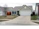 Charming single-Gathering home with a well-maintained lawn and a two-car garage at 2452 Bristol Dr, Franklin, IN 46131