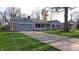 Attractive home featuring attached garage, front lawn and concrete drive at 3121 W 13Th St, Anderson, IN 46011