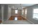 Spacious living room with hardwood floors, recessed lighting, and multiple windows at 3121 W 13Th St, Anderson, IN 46011