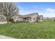 Lovely single-story brick home with a well-kept lawn, manicured landscaping, two-car garage, and great curb appeal at 4038 Oak Trail Dr, Indianapolis, IN 46237