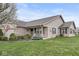 Attractive single-story brick home features a well-maintained lawn, manicured shrubs, and inviting curb appeal at 4038 Oak Trail Dr, Indianapolis, IN 46237