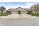 Duplex property features well-maintained lawns, mature trees, and separate two-car garages for each unit at 4038 Oak Trail Dr, Indianapolis, IN 46237