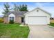 Charming single-Gathering home featuring a two-car garage and well-manicured lawn at 4619 Churchill Downs Cir, Greenwood, IN 46143
