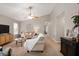 Spacious living room with vaulted ceiling and a warm cozy atmosphere with natural light at 4619 Churchill Downs Cir, Greenwood, IN 46143