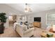 Open living room area featuring neutral paint, large comfy couches and tons of natural light at 4619 Churchill Downs Cir, Greenwood, IN 46143