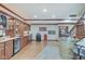 Entertainment space with wet bar, stools, and a mini-fridge for relaxing evenings at 4754 Austin Trce, Zionsville, IN 46077