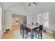 Open dining area with hardwood floors and an open concept to the kitchen at 4754 Austin Trce, Zionsville, IN 46077