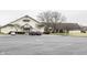Spacious building exterior with ample parking, promising convenience for residents and visitors at 4754 Austin Trce, Zionsville, IN 46077