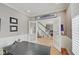 An open home office features hardwood floors and ample natural light, enhanced by French doors at 4754 Austin Trce, Zionsville, IN 46077