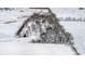 Aerial view showcasing the property and the snowy landscape showing the property lines at 4859 W 150 N, Greenfield, IN 46140