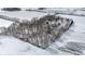 Aerial view showcasing the property and the snowy landscape showing the property lines at 4859 W 150 N, Greenfield, IN 46140