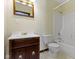 Bathroom featuring a shower-tub combo, a single sink vanity, and a toilet at 4859 W 150 N, Greenfield, IN 46140