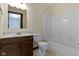 Bathroom featuring a shower-tub combo, a single sink vanity, and a toilet at 4859 W 150 N, Greenfield, IN 46140