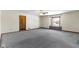 Spacious bedroom featuring soft carpet, ceiling fan and natural light from the window at 4859 W 150 N, Greenfield, IN 46140