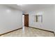 This bedroom features tile floors, neutral walls, and an en suite bathroom at 4859 W 150 N, Greenfield, IN 46140