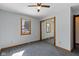 Simple bedroom with neutral paint, carpet flooring, and baseboard trim at 4859 W 150 N, Greenfield, IN 46140