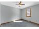 Simple bedroom with neutral paint, carpet flooring, and a window at 4859 W 150 N, Greenfield, IN 46140