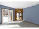 Bright sunroom with tile floors and a stained glass accent over an open archway at 4859 W 150 N, Greenfield, IN 46140