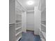 Spacious walk-in closet featuring custom shelving, rods, and ample storage solutions for an organized wardrobe at 4859 W 150 N, Greenfield, IN 46140