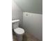 This bathroom features a standard white toilet and ventilation fan at 5139 S Keystone Ave, Indianapolis, IN 46227