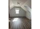 Inviting bedroom features wood floors and a window, offering a serene retreat at 5139 S Keystone Ave, Indianapolis, IN 46227