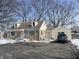 Charming two-story home featuring stone accents, dormer windows, and a well-maintained front yard at 5139 S Keystone Ave, Indianapolis, IN 46227