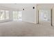 Sun-filled living room with large windows that provides lots of natural light at 5400 W Deer Run Ct, Muncie, IN 47304