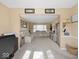 Inviting living room with cozy seating, neutral tones, and ample natural light, creating a comfortable and welcoming atmosphere at 5415 Honey Comb Ln, Indianapolis, IN 46221