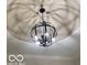 Contemporary chandelier with a globe design and recessed lighting highlighting the ceiling at 6641 Stone Pointe Way, Indianapolis, IN 46237