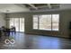Open-concept dining area with sliding doors and lovely natural light at 6641 Stone Pointe Way, Indianapolis, IN 46237