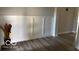 The entryway features decorative wainscoting and lovely wood flooring at 6641 Stone Pointe Way, Indianapolis, IN 46237