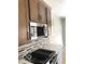 Kitchen with backsplash, stainless steel appliances and gas stovetop at 6641 Stone Pointe Way, Indianapolis, IN 46237