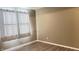 Well-lit bedroom featuring light-colored walls, plank flooring, and window that brings in natural light at 673 Ballycastle Ct, Pendleton, IN 46064