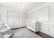 Bright Bedroom with hardwood floors and neutral decor for new baby at 720 S Rangeline Rd # 601, Carmel, IN 46032
