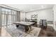 Stylish game room with a pool table and bar-height seating at 720 S Rangeline Rd # 601, Carmel, IN 46032