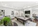 Elegant game room equipped with a billiard table and a cozy lounge at 720 S Rangeline Rd # 601, Carmel, IN 46032