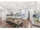 Stylish kitchen with an island, modern appliances, cabinetry, and a walk-in pantry, perfect for gourmet cooking at 720 S Rangeline Rd # 601, Carmel, IN 46032