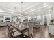 Spacious kitchen, open floor plan with connecting dining and living spaces at 720 S Rangeline Rd # 601, Carmel, IN 46032