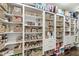 Walk-in pantry with lots of shelves and storage baskets for organization at 720 S Rangeline Rd # 601, Carmel, IN 46032