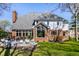 Expansive backyard featuring a patio and a well-maintained lawn at 8845 Otter Cove Cir, Indianapolis, IN 46236