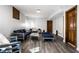 Finished basement with modern furniture, flooring, and natural lighting at 8845 Otter Cove Cir, Indianapolis, IN 46236
