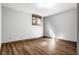 Inviting bedroom with ample natural light and hardwood floors at 8845 Otter Cove Cir, Indianapolis, IN 46236