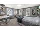 A gray bedroom with a desk and chair at 925 Forest Dr, Anderson, IN 46011