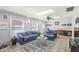 Spacious living room with a fan and plenty of natural light at 925 Forest Dr, Anderson, IN 46011