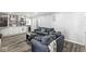 Relaxing living room with neutral decor, built-in shelving, and comfortable seating offers a serene space at 925 Forest Dr, Anderson, IN 46011
