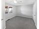 Bright bedroom features neutral walls, carpet, closet and a ceiling fan at 102 Plummer Ave, Bargersville, IN 46106