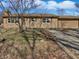 Ranch home with a gravel drive and an attached garage at 102 Plummer Ave, Bargersville, IN 46106
