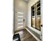 Stylish entryway features modern door, sleek flooring, and an artistic subway-themed accent at 1042 Nelson Ave, Indianapolis, IN 46203